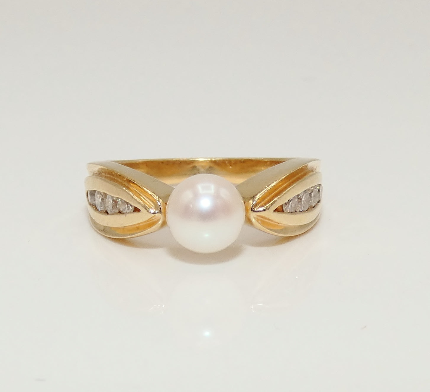 Diamond and Four Pearl Ring